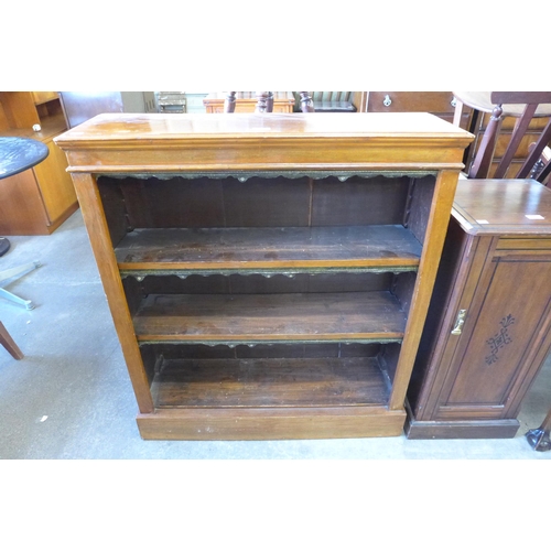 150 - A Victorian walnut open bookcase