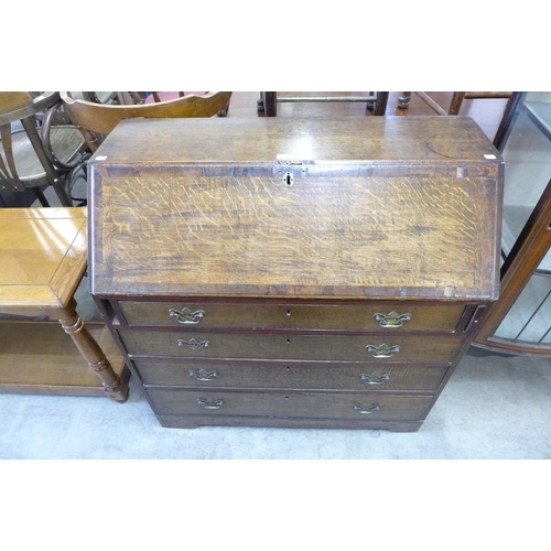 154 - A George III oak bureau