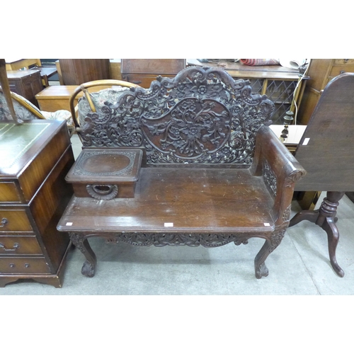 167 - A Burmese carved hardwood bench