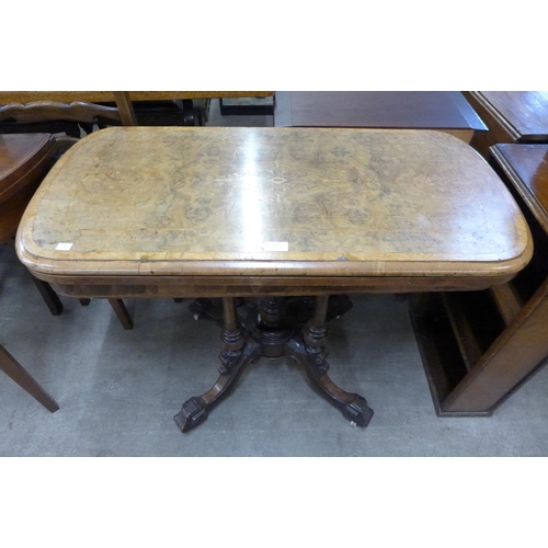 171 - A Victorian inlaid burr walnut fold over games table