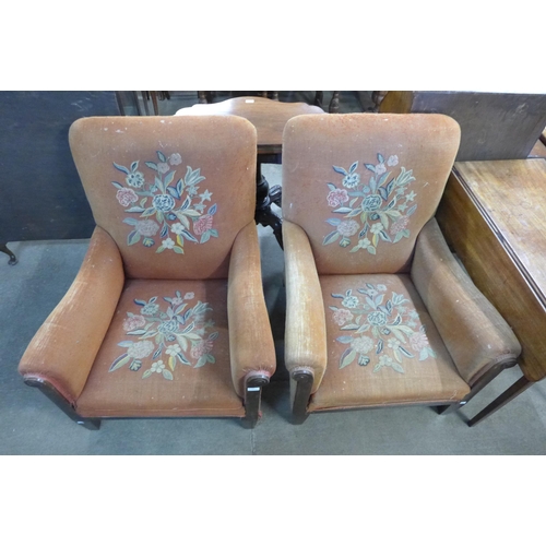 187 - A pair of Art Deco mahogany and fabric upholstered armchairs