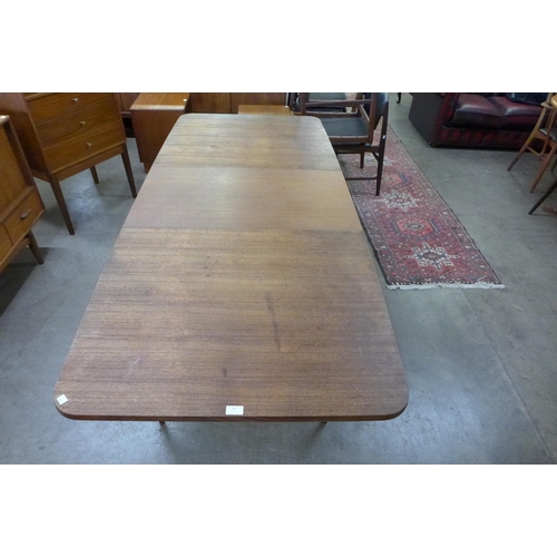 21 - An Archie Shine teak extending Hamilton dining table, designed by Robert Heritage