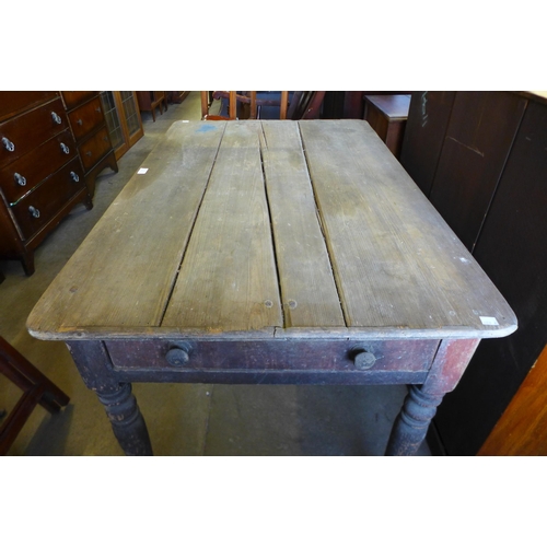 212 - A Victorian pine two drawer kitchen table