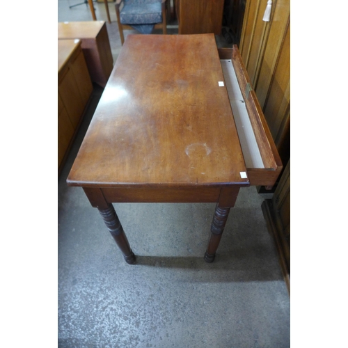 215 - A Victorian mahogany single drawer serving table