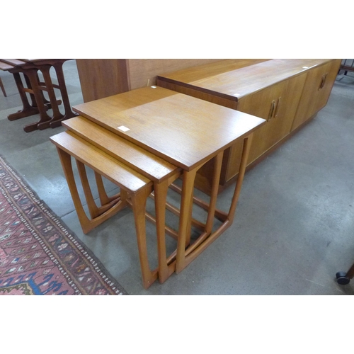 25 - A teak nest of tables