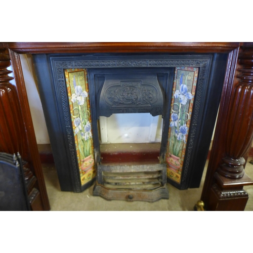 257 - A Victorian Aesthetic Movement cast iron fire surround with Aesthetic Movement tiles, later carved h... 