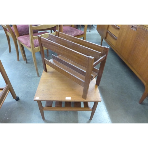 27 - A teak magazine rack and a small teak coffee table