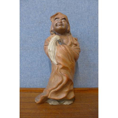 308 - A Japanese carved softwood figure of Wei-To and another oriental figure