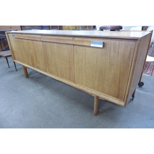 34 - A teak sideboard