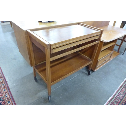 36 - A teak metamorphic trolley