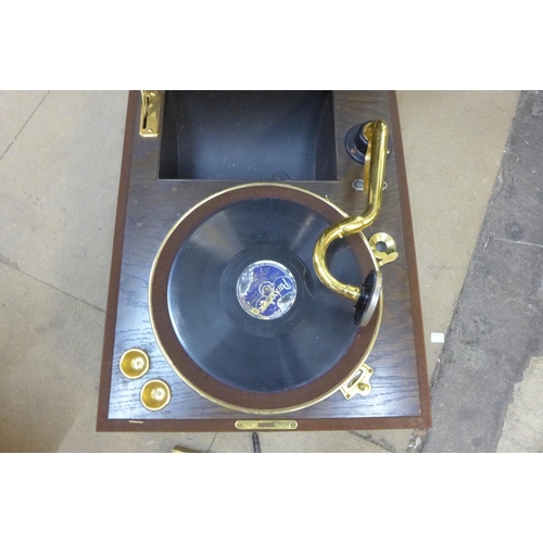 435 - A HMV Farmers gramophone in wooden case with brass fittings