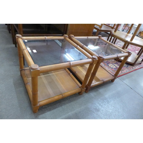 45 - A pair of G-plan faux bamboo and glass topped occasional tables