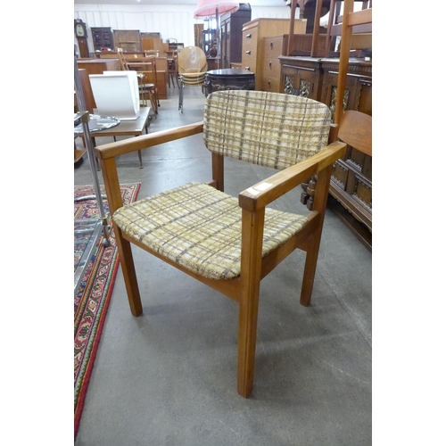 48 - A William Lawrence teak elbow chair