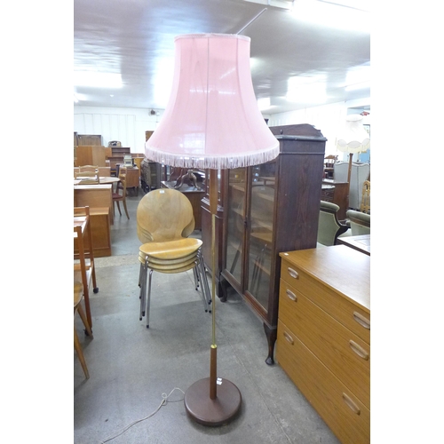 55 - A teak standard lamp