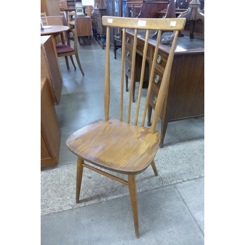 58 - An Ercol Blonde elm and beech 608 model chair