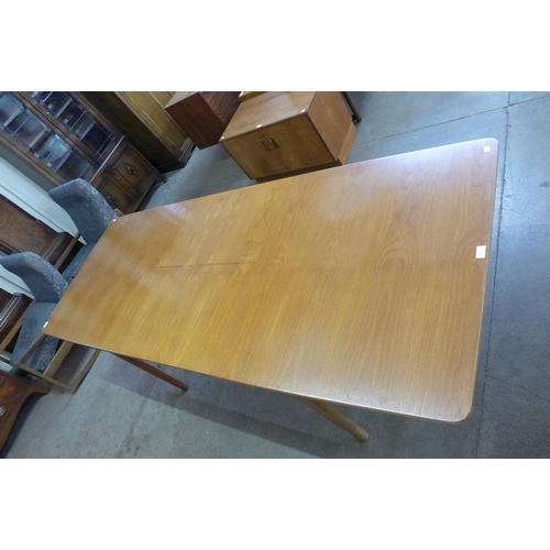 7 - A McIntosh teak T3 extending dining table