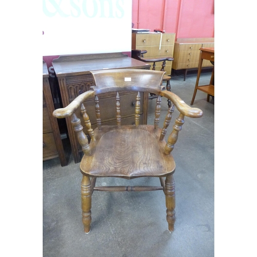 76 - An elm and beech smokers bow chair