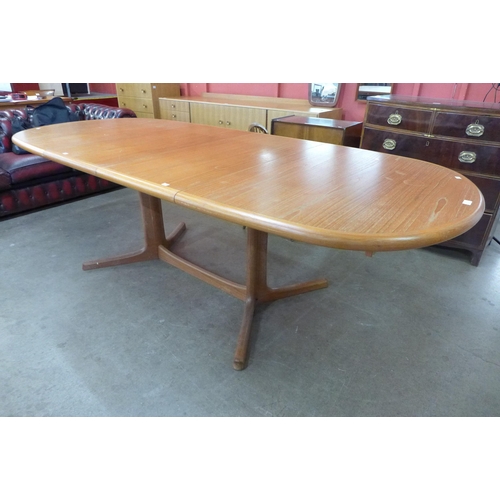 8 - A Danish Gudme Mobelfabrik teak extending dining table