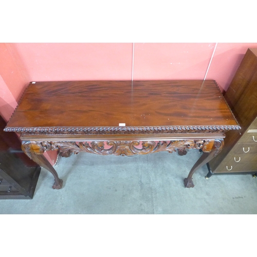 82 - A Regency style carved hardwood serving table