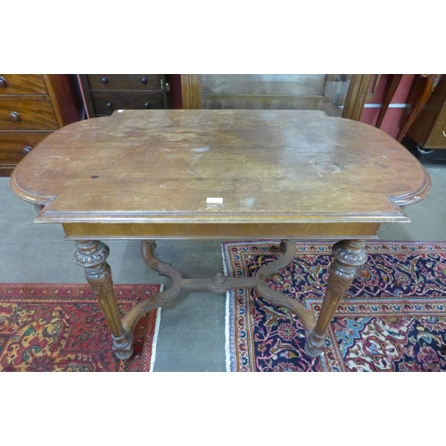 88 - A19th Century French walnut bow end library table