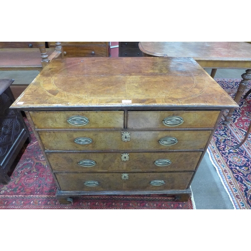 92 - A George I inlaid walnut chest of drawers