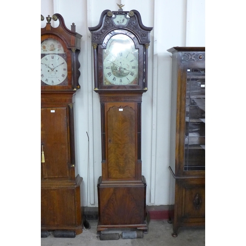 94 - A George III mahogany longcase clock, the painted moonphase rolling dial signed Banks, Oldham