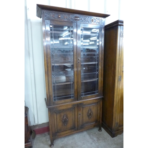 96 - An early 20th Century carved oak bookcase