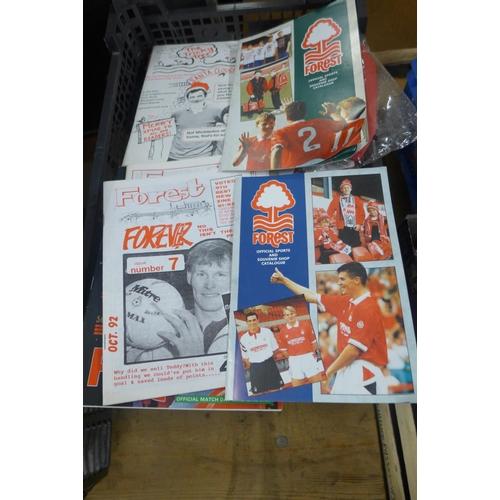 2124 - 6 boxes of Nottingham Forest football programmes, various seasons, videos, season ticket, etc.