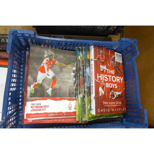 2124 - 6 boxes of Nottingham Forest football programmes, various seasons, videos, season ticket, etc.