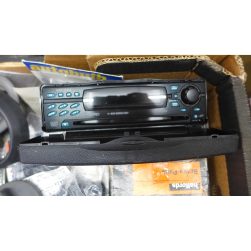 2245 - Box of auto/car related items; brake pads, radio, Transit manuals, Ford manuals, Suzuki key fob & to... 