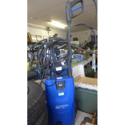 2043 - Nilfisk C110.7 Pressure washer with hose pistol and patio scrubbing pad. lightly used