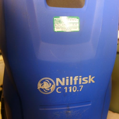 2043 - Nilfisk C110.7 Pressure washer with hose pistol and patio scrubbing pad. lightly used