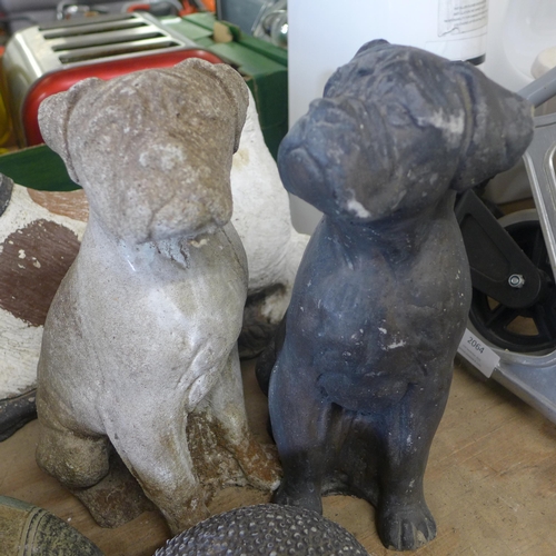 2063 - 8 Stone garden figures