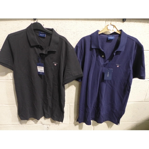 3272 - 2 Men's Gant polo T-shirts, (medium black and large navy) * this lot is subject to VAT