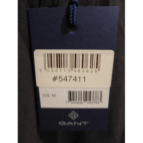 3272 - 2 Men's Gant polo T-shirts, (medium black and large navy) * this lot is subject to VAT