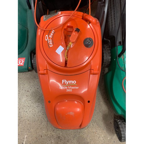 2321 - Flymo Glidemaster 360 electric lawnmower and a Flymo garden vacuum blower