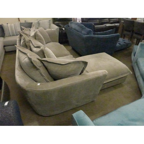 1361 - A stone velvet oversized sofa and footstool