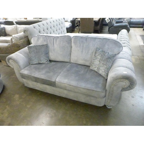 1405 - A Gracie cloud grey velvet and studded three seater and two seater sofa with swivel love seat * this... 