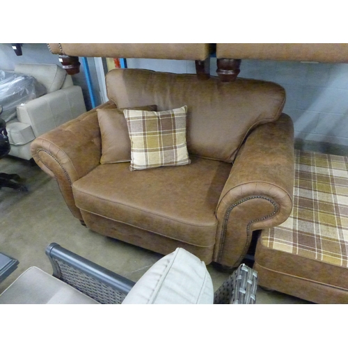 1420 - A County tan upholstered three seater sofa and love seat with tartan footstool * this lot is subject... 