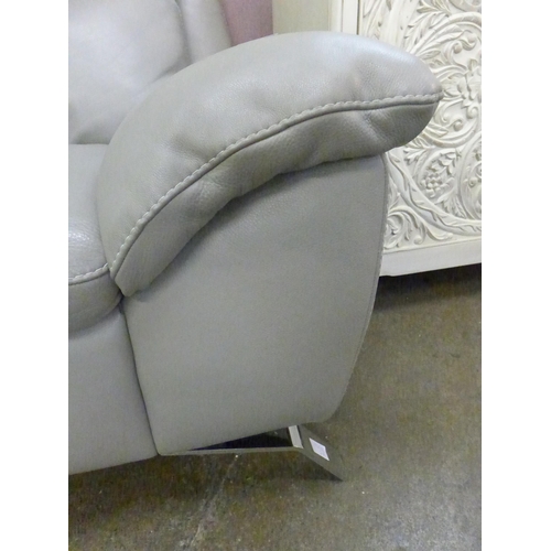 1473 - A grey leather upholstered armchair