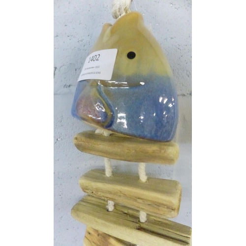 1402 - A driftwood and ceramic fish mobile, H 10cms (660407)   #