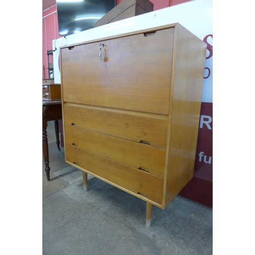 596 - A Hille beech and cherrywood Hilleplan unit J writing cabinet, designed by Robin Day