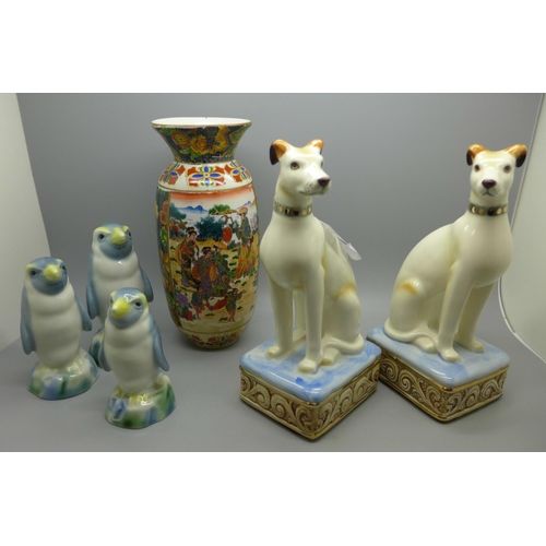 1008 - Three penguin decanters, a pair of dogs and a vase **PLEASE NOTE THIS LOT IS NOT ELIGIBLE FOR POSTIN... 