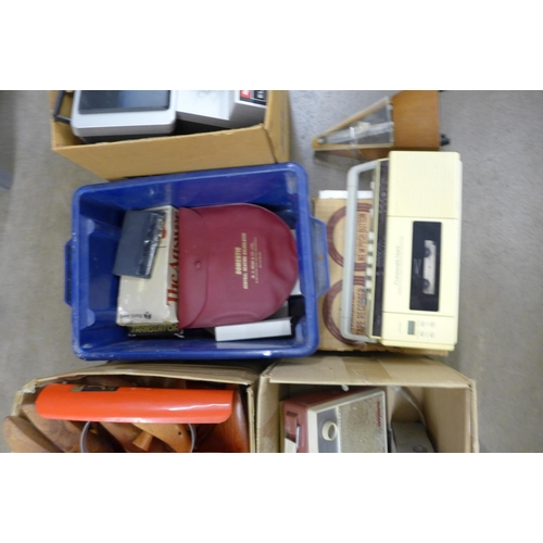 1025 - Four boxes of assorted items; tape reels, a metronome and a tape recorder **PLEASE NOTE THIS LOT IS ... 