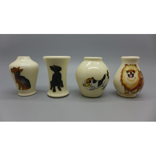 636 - Four miniature Moorcroft vases, all with dog detail, 54mm