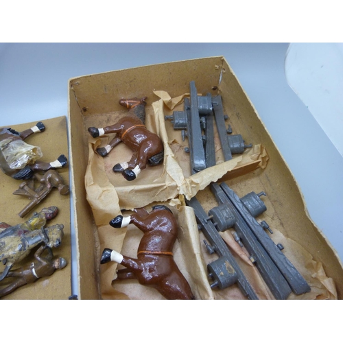 646 - A box of early 20th Century lead soldiers, warships, horses, etc., some a/f