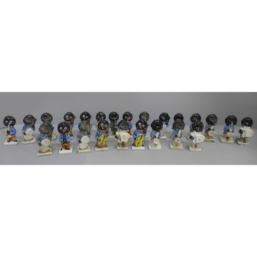 662 - A collection of Wade Robertsons ceramic advertising band figures, 21 in total, five a/f