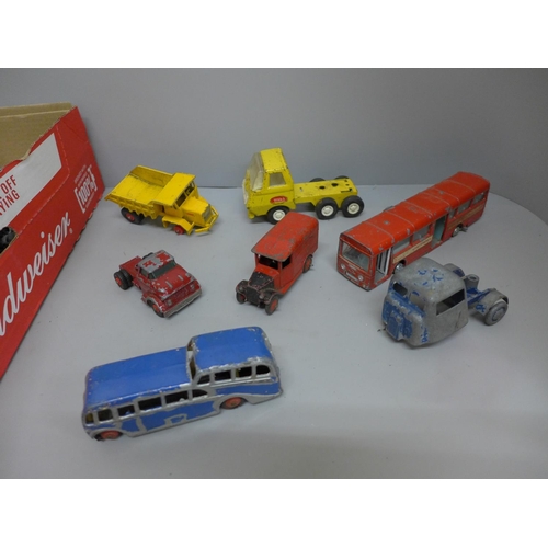 688 - A collection of Dinky, Timpo and Lesney die-cast model vehicles, playworn