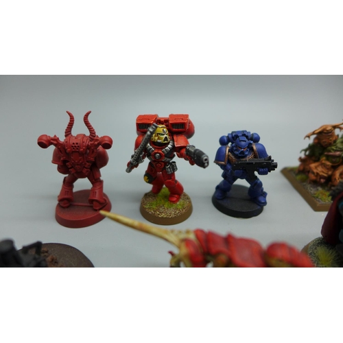 712 - A collection of painted Warhammer figures, many finished to a very high standard