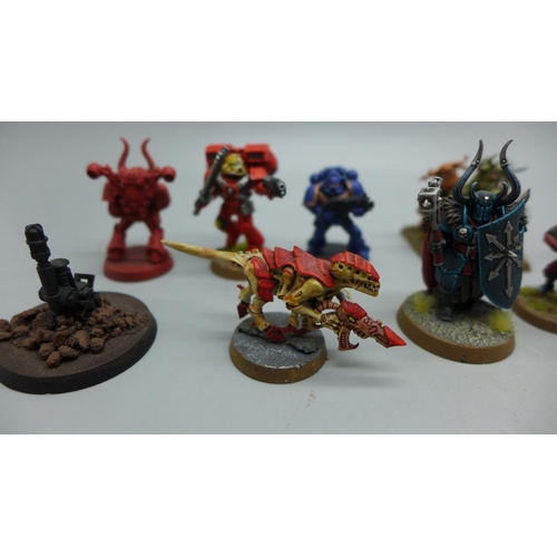 712 - A collection of painted Warhammer figures, many finished to a very high standard